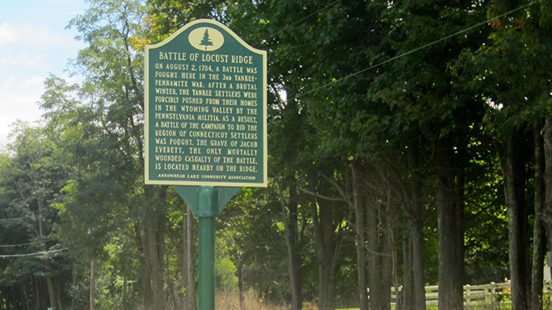 The Battle of Locust Ridge historical marker is placed near the site of the conflict in 1784.